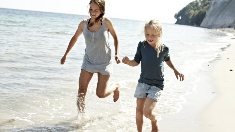 Children playing at beach of Møns Klint, Denmark