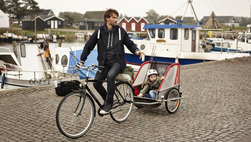 Father with kid on a bike in Bork Havn