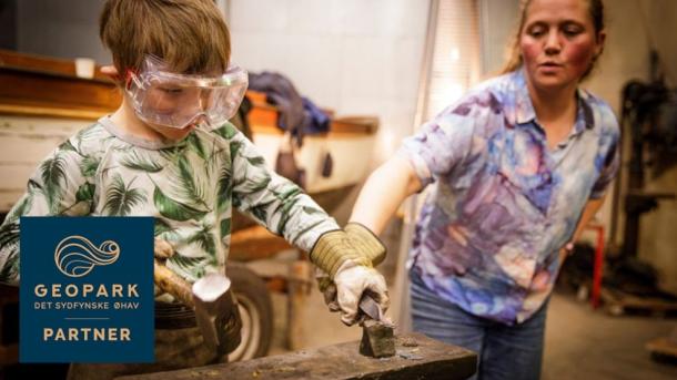 kid playing at the Old Shipyard