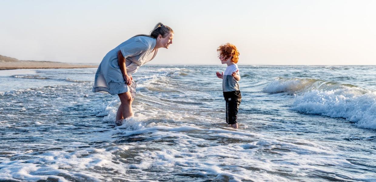 Mother and son at the beach in Blockhus