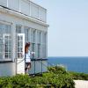 A woman walks out of Helenekilde Badehotel in North Zealand, Denmark