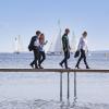 Business people walking on Aarhus infinite bridge