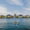 Kayaks in front of Amalienborg Castle in the harbour of Copenhagen, Denmark