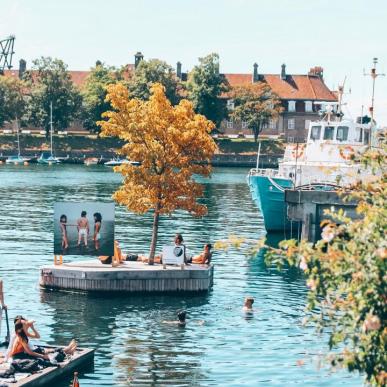 People enjoy the water around La Banchina in summer