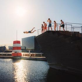 Islands Brygge harbour bath in Copenhagen is a popular spot to cool down in summer